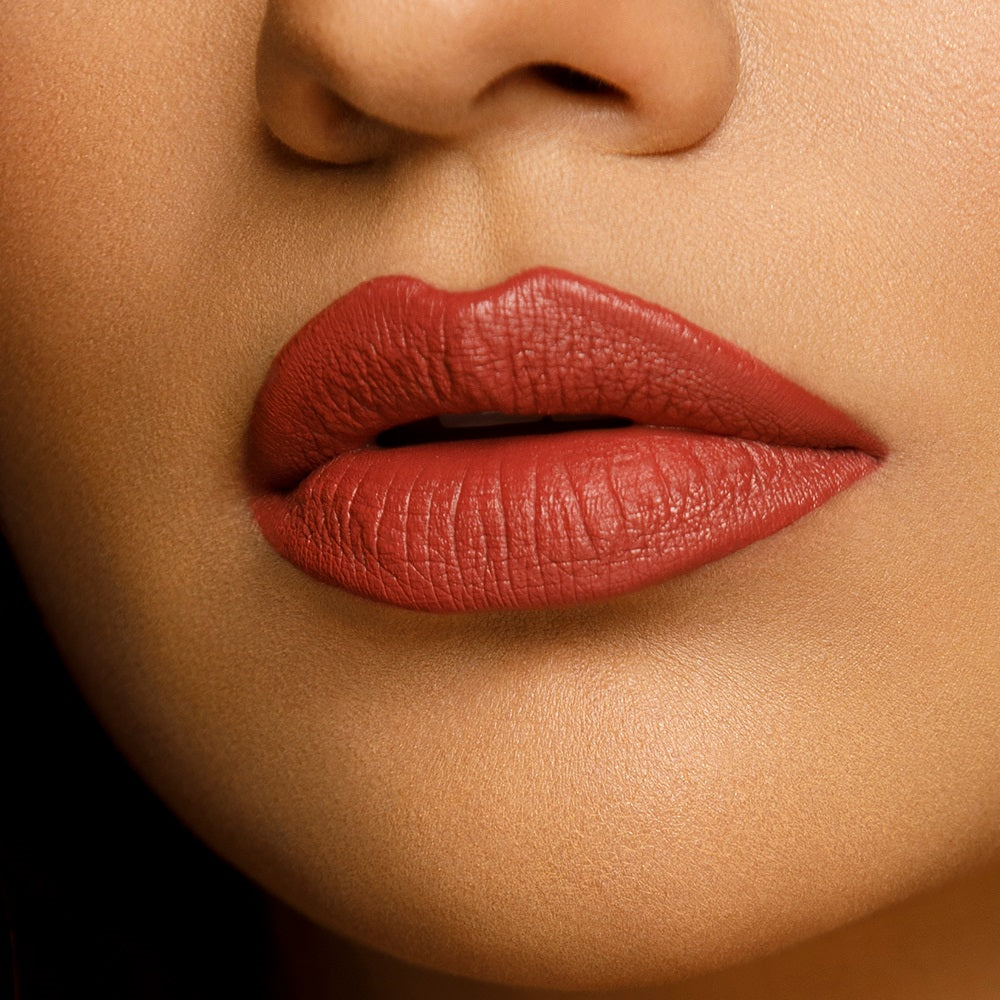 Sara Ali Cosmetics Capricorn warm tone medium dark coral lipstick