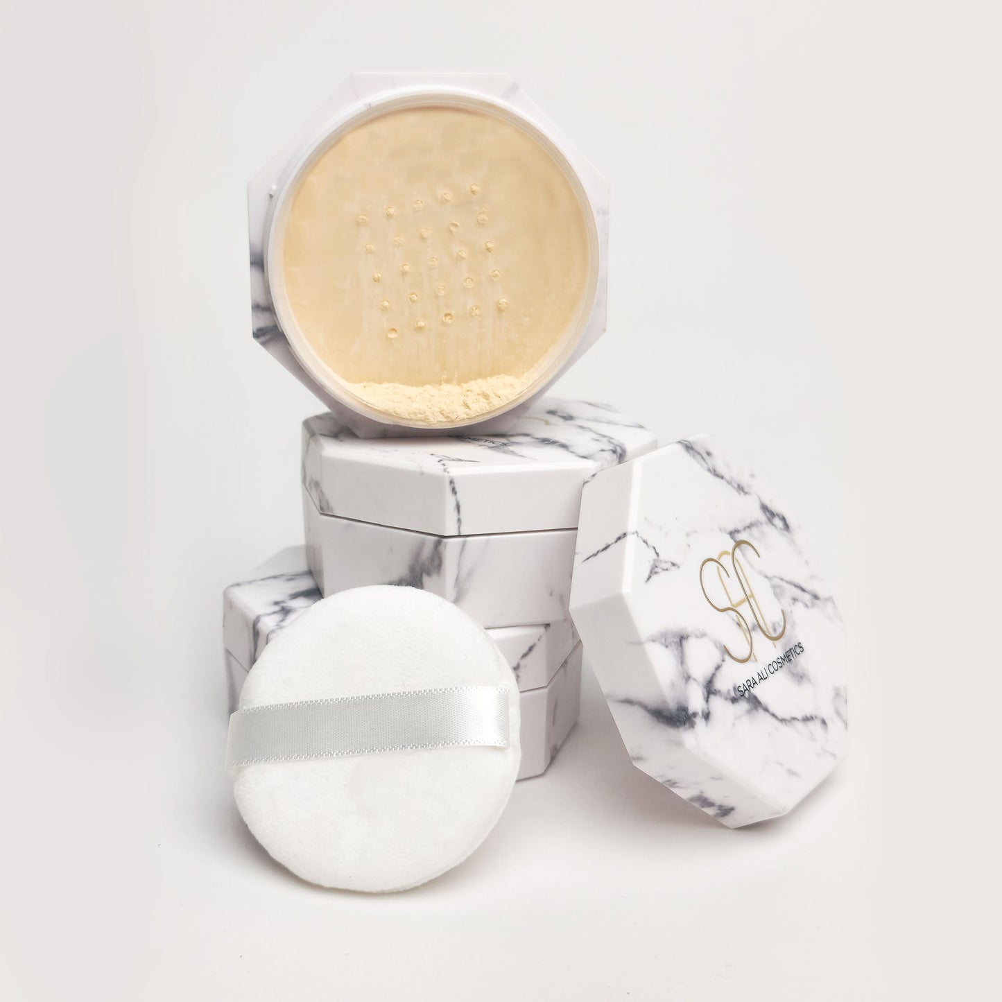 Sara Ali Cosmetics powder and highlighter face makeup