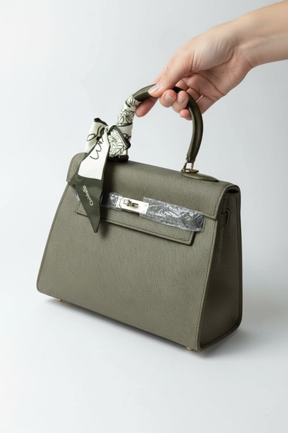 Chrisbella olive green luxury handbag with silver lock hardware and decorative scarf for women in UAE